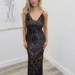 thea backless black gown